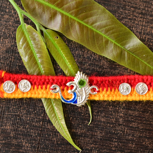 Stylish Silver Om Rakhi with Colorful Design